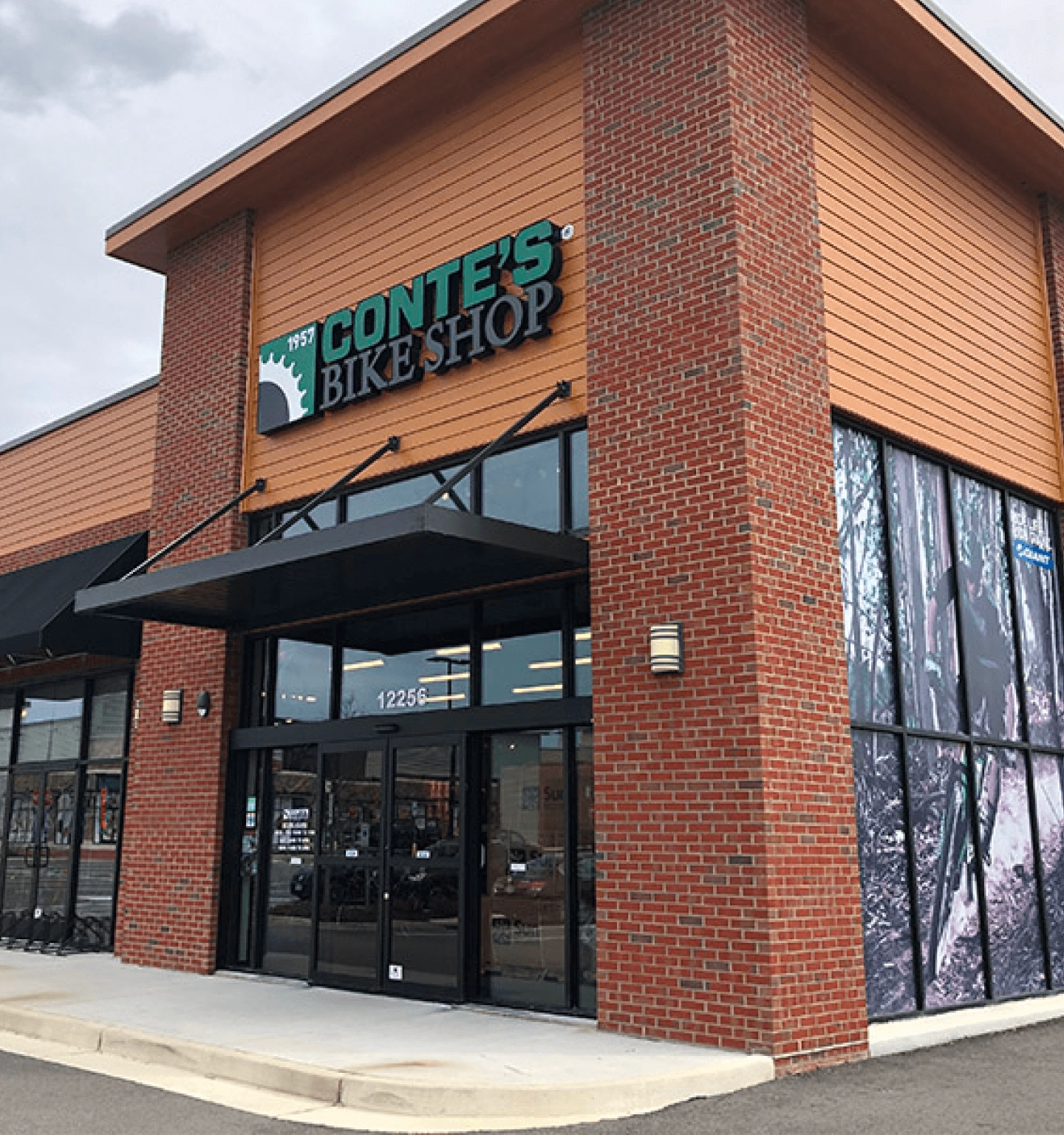 The brick front of a local bike shop that carries Rad ebikes