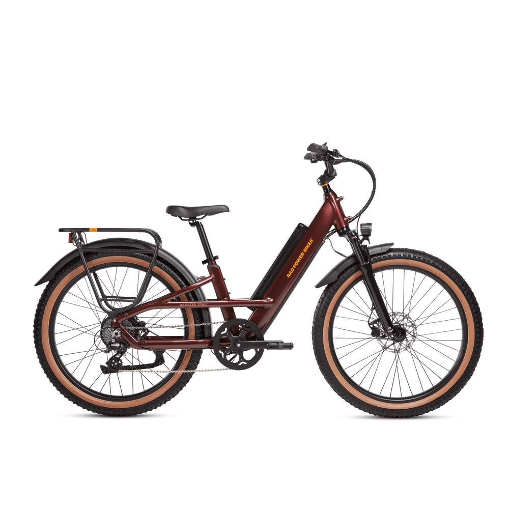 A copper red Radster Trail electric off-road bike