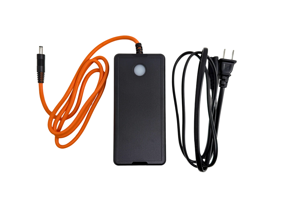 A battery charger with an orange cable